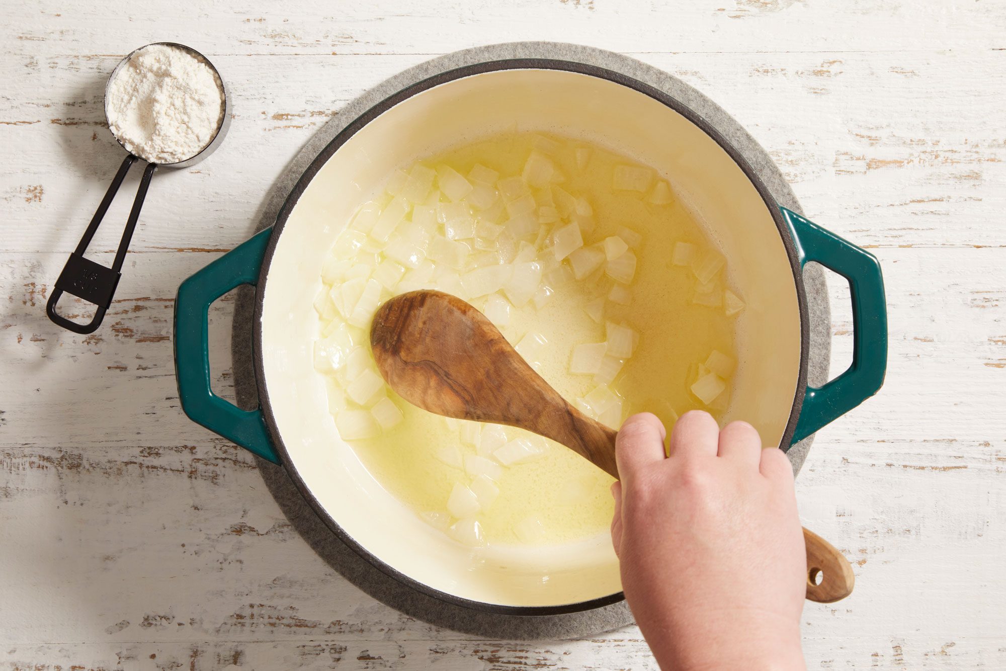 In a large saucepan, saute onion in butter until tender.