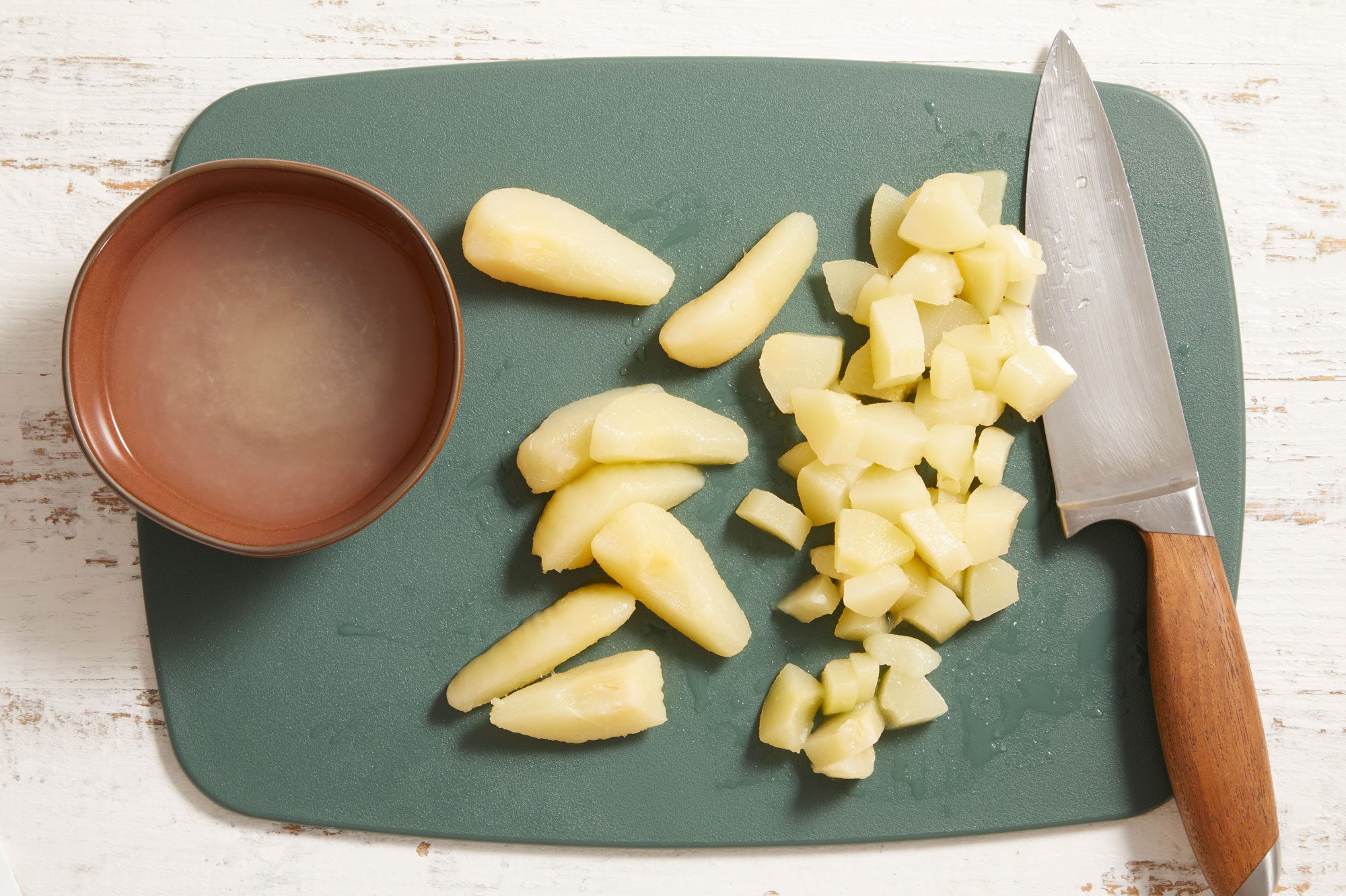 Drain pears, reserving the syrup; chop pears.