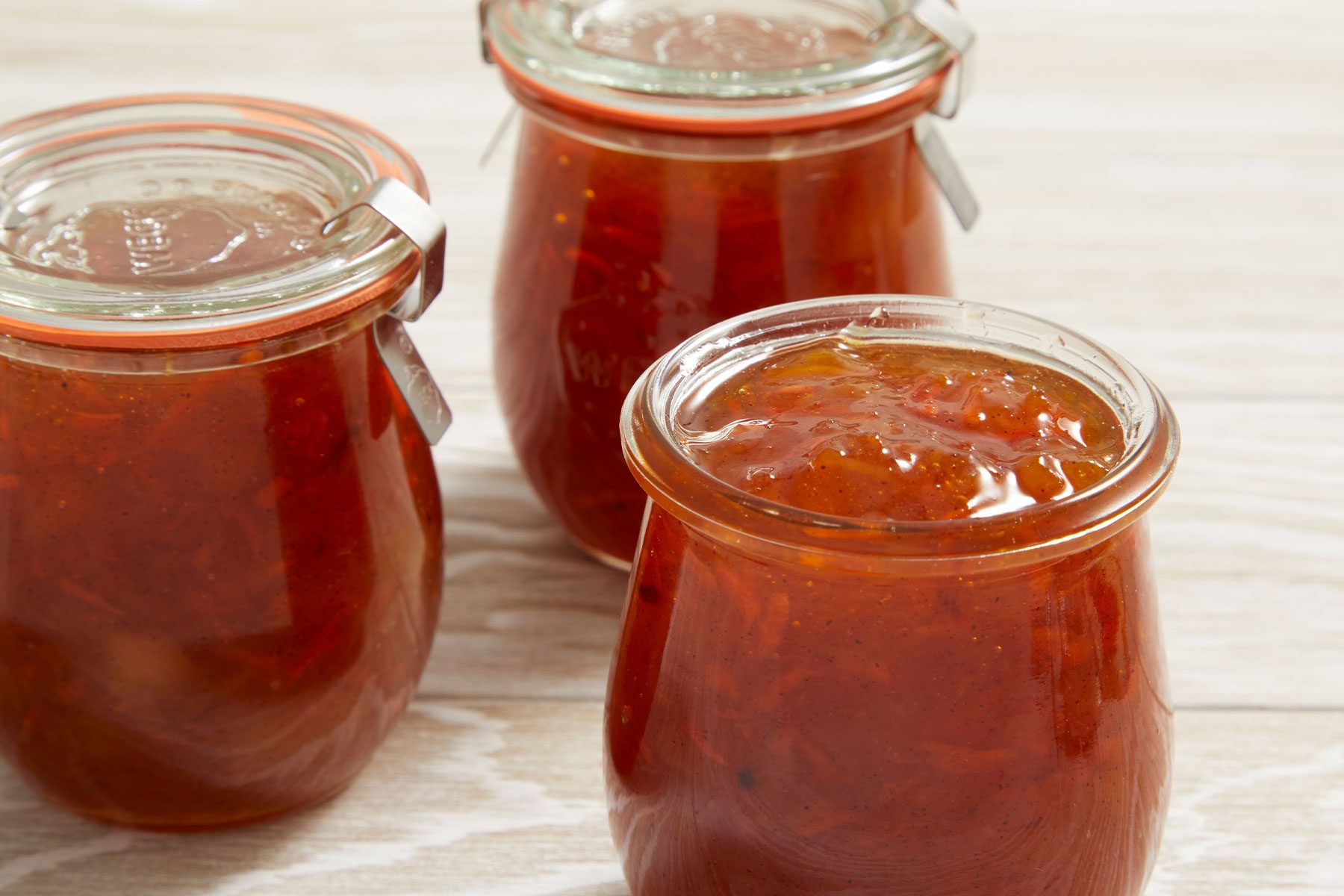 Carrot Cake Jam filled in three small glass jars.