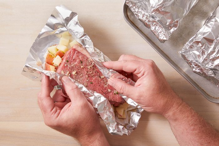 Folding the Steak And Potato Foil Pack.