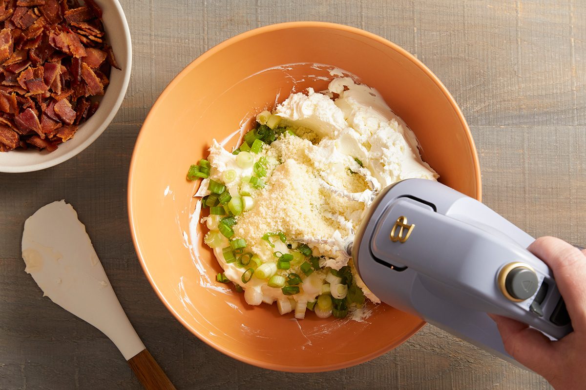 In a small bowl, beat the cream cheese, mayonnaise, Parmesan cheese