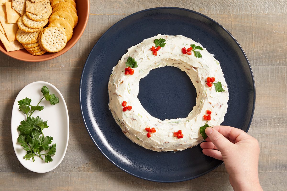 Garnish with parsley and pimientos