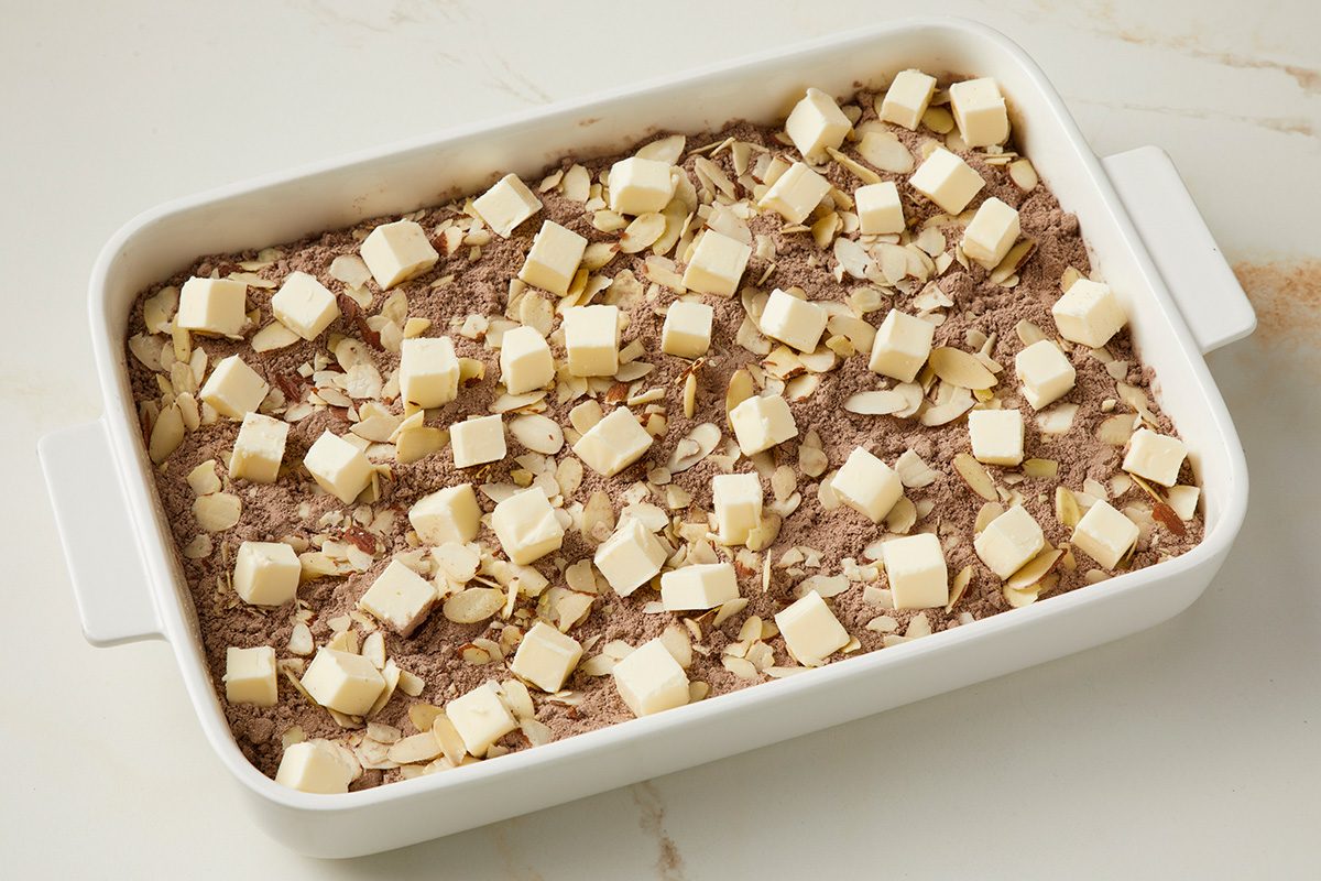 Topping with cubed butter
