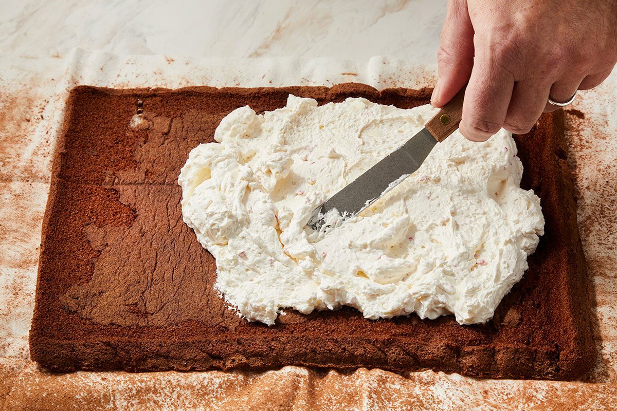 Spreading filling over cooled cake