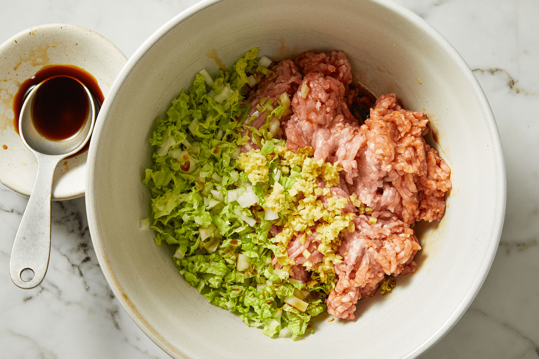 Mixing ingredients for the filling of Bao Buns Baozi