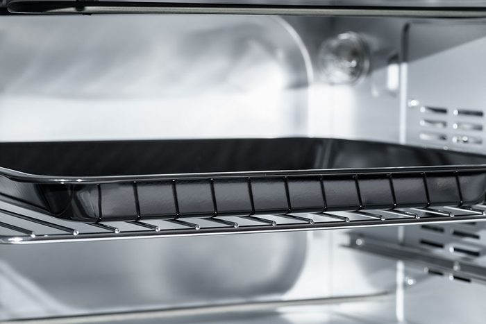 Empty Electric oven view inside. Microwave