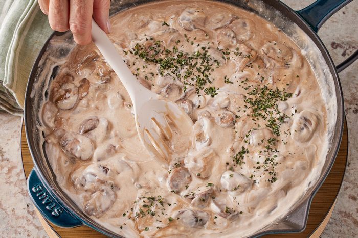 sour cream, thyme and reserved mushroom mixture in the broth sauce.