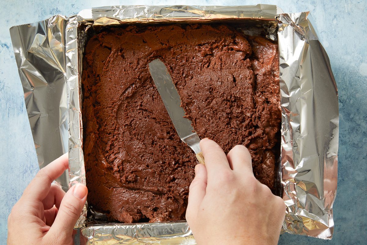 fudge being spread in pan